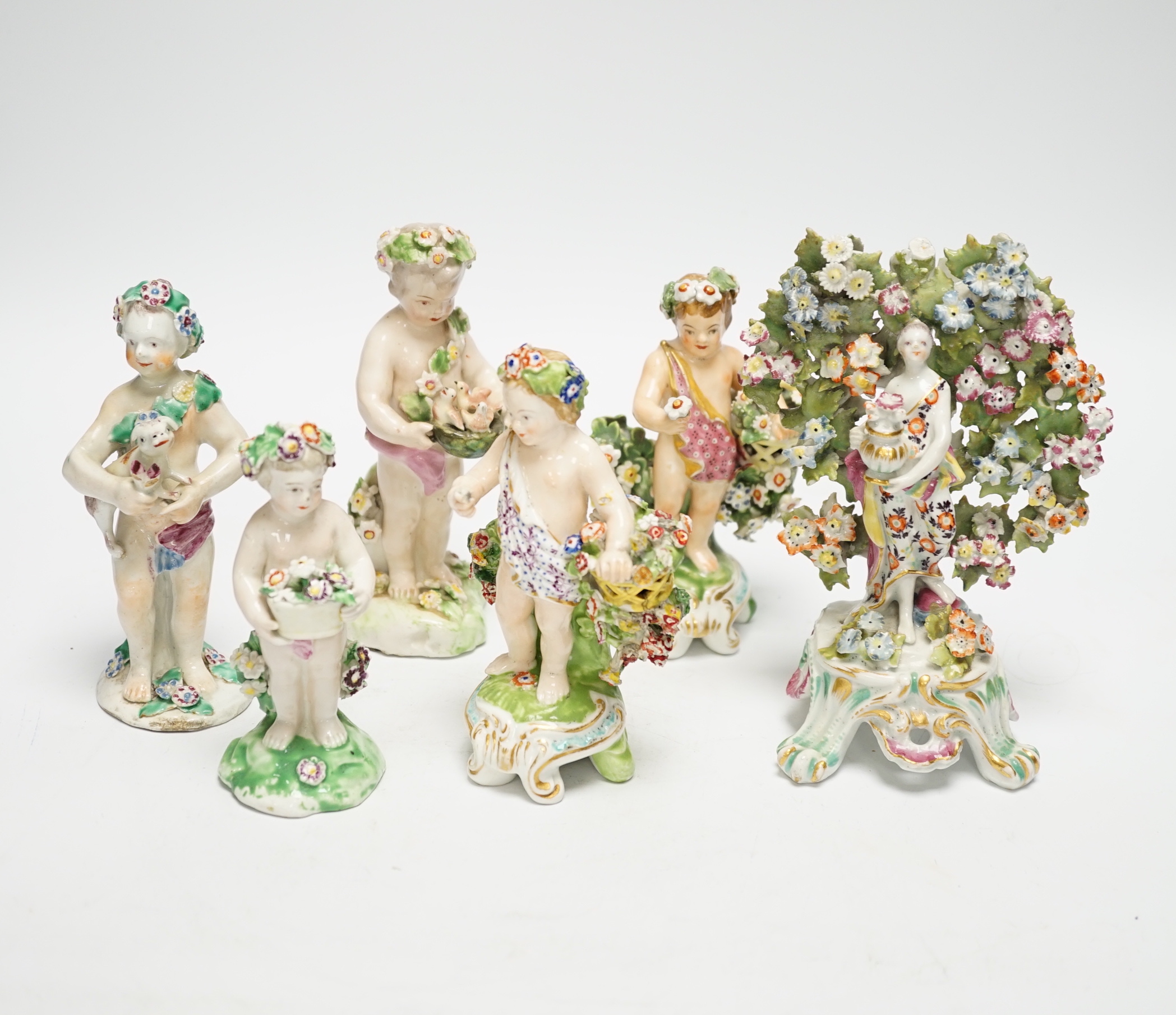 Six 18th/19th century figures by Bow and Derby, including a flower encrusted Bow figure with bocage, 15cm